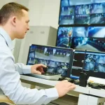 Home Monitoring Systems a Man Watching on the Screen